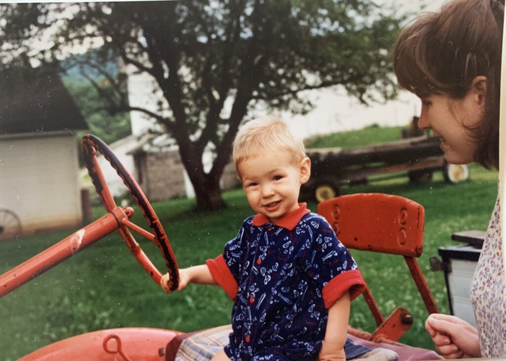 A young Colin Craig enjoying a tractor