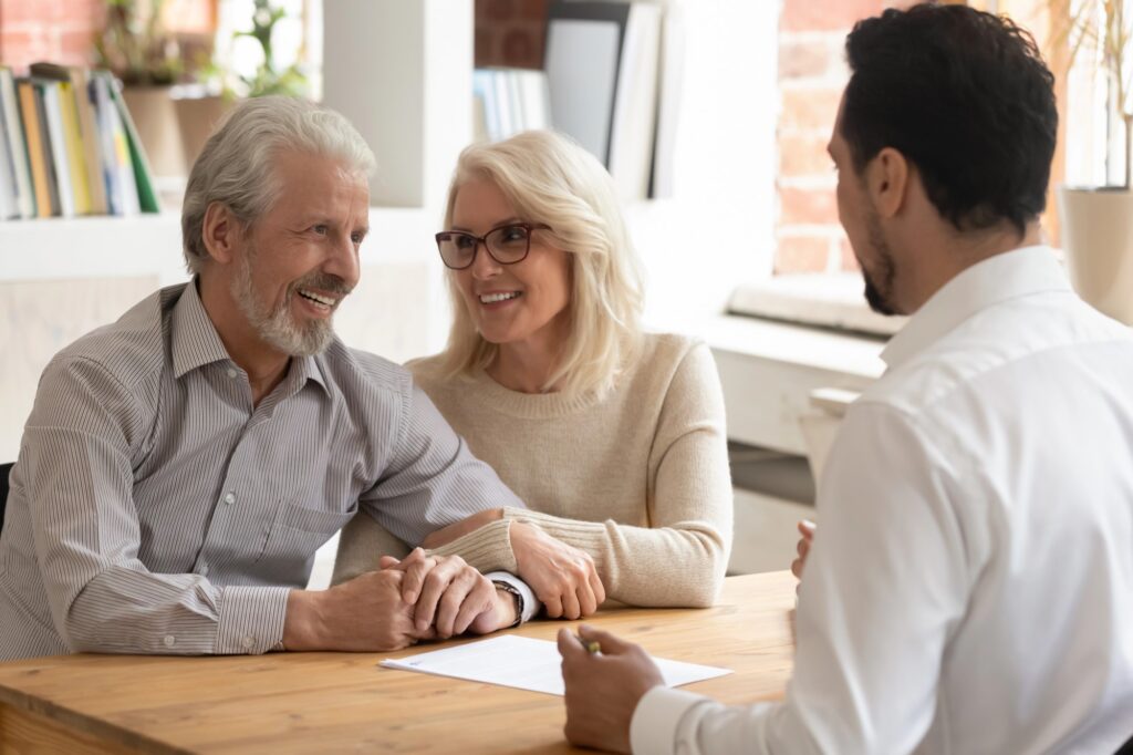Confident couple with advisor