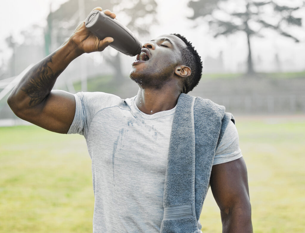 Athlete drinking water